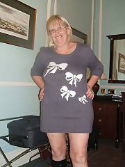 Wife strips for some hotel apartment fun, the tattoo is a fairly recent addition