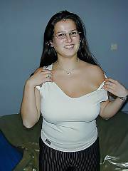 Boobed brunette MILF exposes her good massive boobies.