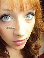 Sweet extra ordinary redhead babe next-door will fascinate you by her big blue eyes, nice tits, round ass, hot legs and feet, and natural red haired vagina of course