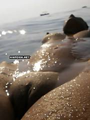 Tanned lady with hard nips and cute shaved vagina swimming in the ocean and flashing her goods from underwater