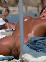 Nudist and naturist gals spreading legs on the nude beach to let twat sunbathing too, Voyeurists of all kinds take voyeur xxx photos by big lens cameras