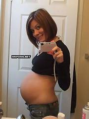 Girlfriend got pregnant and now enjoys to make nude selfie pics in front of the mirror, She looks so hot with huge pregnant belly and small boobies becoming so fuckin milky - amateur porn photos