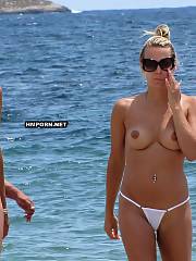 nudist walking beach spreading
