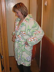 MILF in a thong moving around the house, she put on a robe at some point but penetrate that