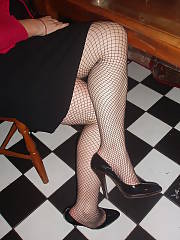 Creepy mamma flashing her twat through her fishnets, not sure if itd hit it or not