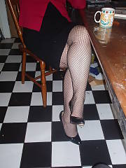 Creepy mamma flashing her twat through her fishnets, not sure if itd hit it or not