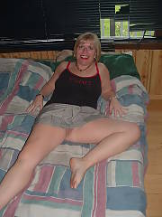 Sexy mamma showing for all to see. that shirt is deadly accurate she flirts when everybody, men and women.