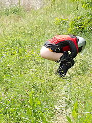 Biker woman pissing with helmet Amateur MILF Pissing