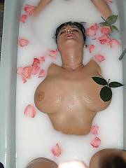 busty brunette sucking cock