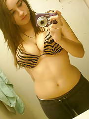 Sexy busty teen selfshot in the bathroom.