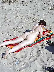 Mamma woman - huge and white ass - on the beach.