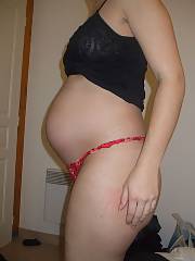 Sexy pregnant girlfriend exposing off her mummy tummy and good lactating jugs