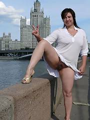 Naughty mature whore goes along the street with a nude ass!  shell do anything for a good hard prick into her!