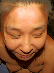 Korean lady sucking pecker and posing for pics - just because shes old as heel doesnt mean she doesnt get a pecker craving every once in awhile
