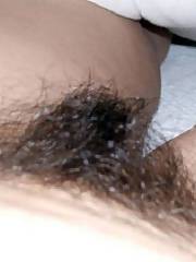 Here are some pictures of my bush and hot sweaty vagina.  mu husband likes to run his fingers through it and play with while he finger penetrates me