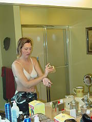 My mom getting ready to go out with her banging boyfriend. serves her right if i post these online!