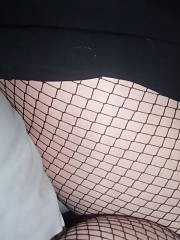 Creepy mamma flashing her twat through her fishnets, not sure if itd hit it or not