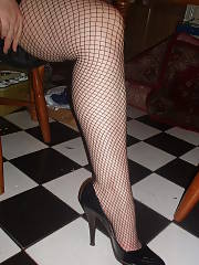 Creepy mamma flashing her twat through her fishnets, not sure if itd hit it or not