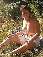 mom behind breasts