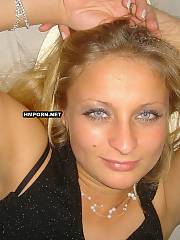 lighthaired milf teasing stripping