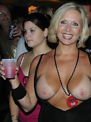 MILF topless in a bar